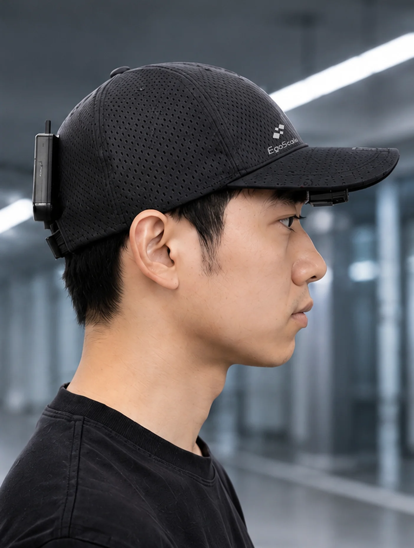 Person wearing EgoScale Capture C1 for real-world egocentric data collection.